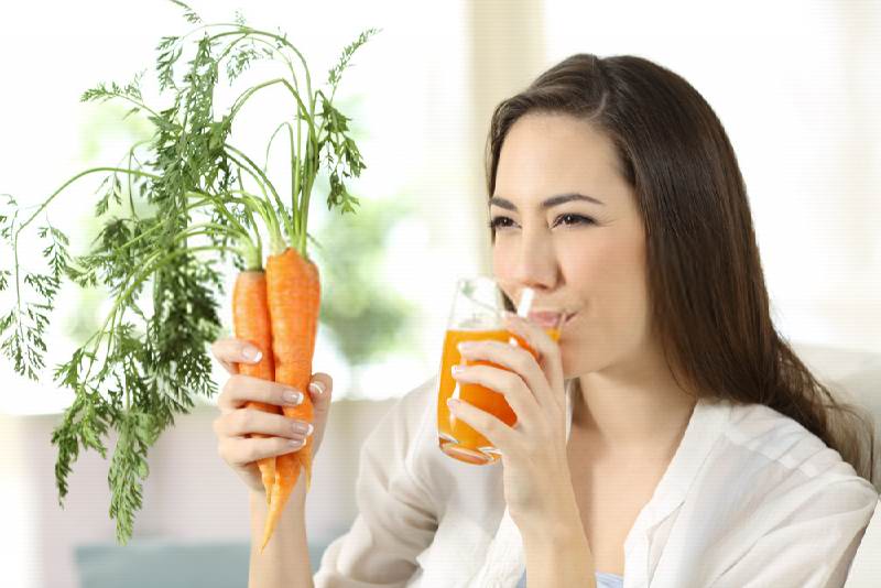 drinking carrot juice